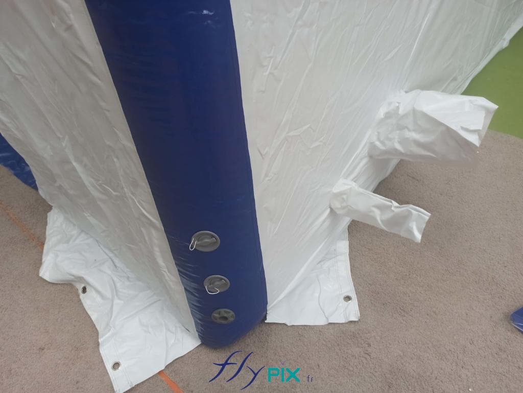 Detailed view of the check valves and pressure relief valves. NRBC (Nuclear, Radiological, Biological and Chemical Weapons) inflatable tent, for first aid, decontamination, for cleaning or disinfecting people or equipment, captive air, waterproof PVC envelope.