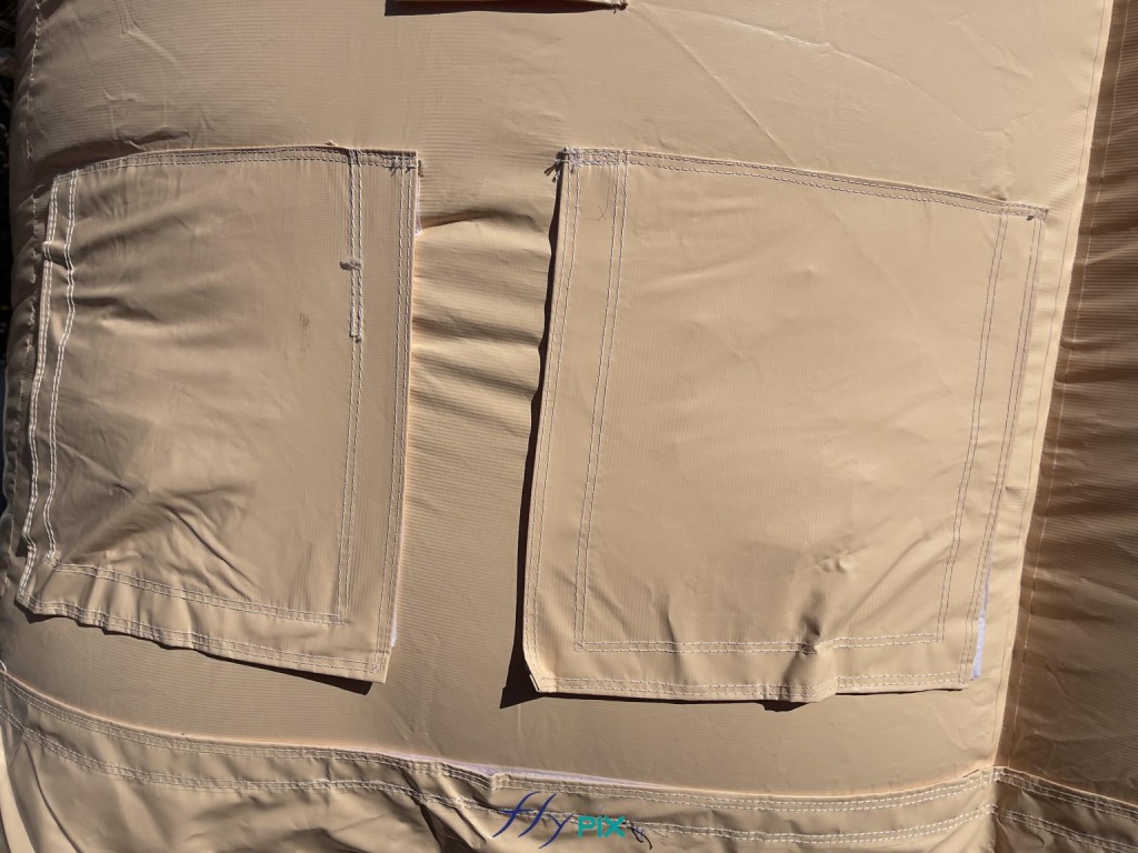 Here are two folded air sleeves, with their protective covers and flaps attached. - Copyright: Vivien LAÏLLE/FLYPIX, all rights reserved. Here are two folded air sleeves, with their protective covers and flaps attached. – Copyright: Vivien LAÏLLE/FLYPIX, all rights reserved.